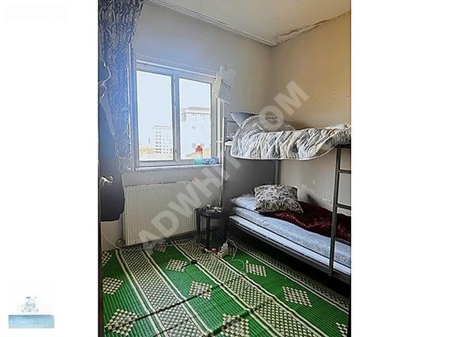 BAŞAKŞEHİR GÖÇMEN KONUTLARI ARSA PAYI YÜKSEK SATILIK DAİRE