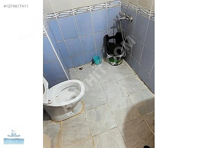 BAŞAKŞEHİR GÖÇMEN KONUTLARI GİRİŞ KAT SATILIK DAİRE