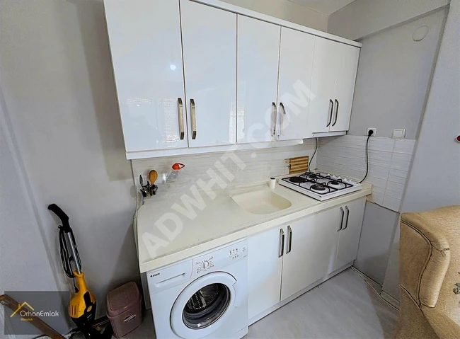 Apartment for sale in Altınoluk, below the main road, 1+1