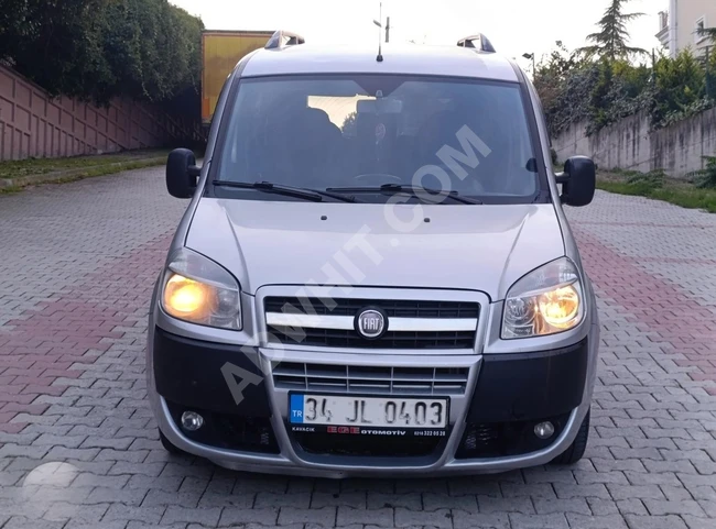 FIAT DOBLO 1.3 MULTIJET SAFELINE car, 2012 model, diesel, with two side sliding doors.