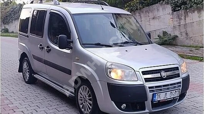 FIAT DOBLO 1.3 MULTIJET SAFELINE car, 2012 model, diesel, with two side sliding doors.