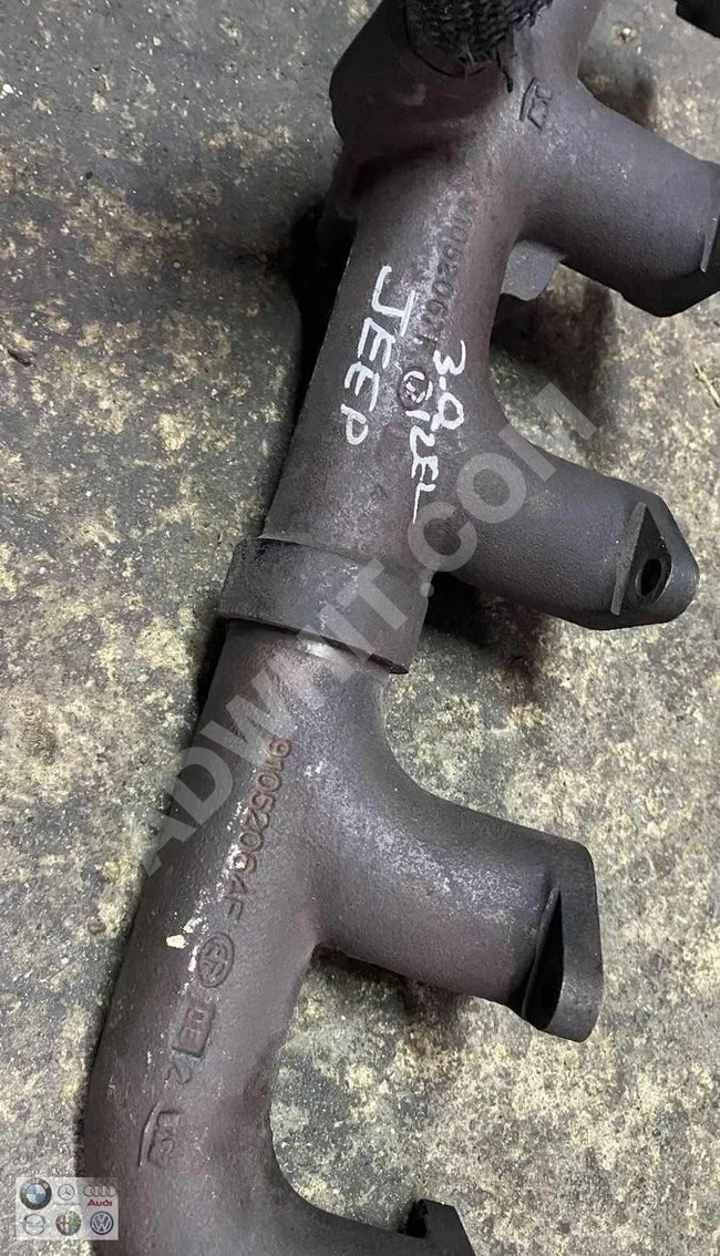 JEEP G. CHEROKEE 3.1 exhaust manifold (original) used