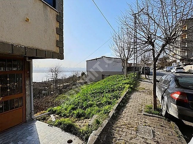 A plot of land for sale with an area of 471 square meters and a lake view in YARIMBURGAZ.