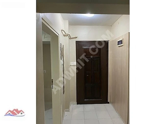 GÖÇMEN KONUTLARINDA TEMİZ GİRİŞ DAİRE