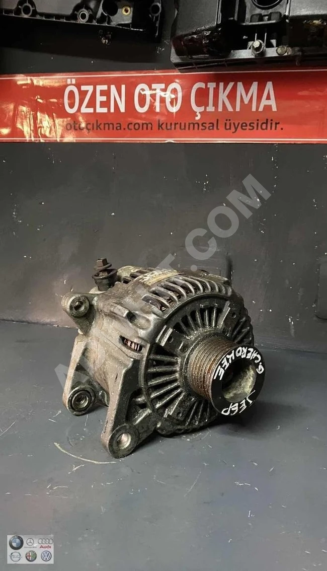 JEEP G. CHEROKEE 3.1 charging alternator (original)