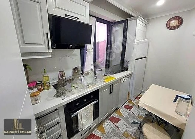 شقة 2+1 بمساحة 56 متر مربع، مع حديقة، الطابق الأرضي، في حي FEVZİÇAKMAK