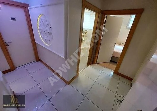 شقة أرضية 2+1 بمساحة 80 متر مربع، مع استخدام حديقة وموقع ممتاز.