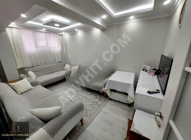 شقة 2+1 بمساحة 56 متر مربع، مع حديقة، الطابق الأرضي، في حي FEVZİÇAKMAK