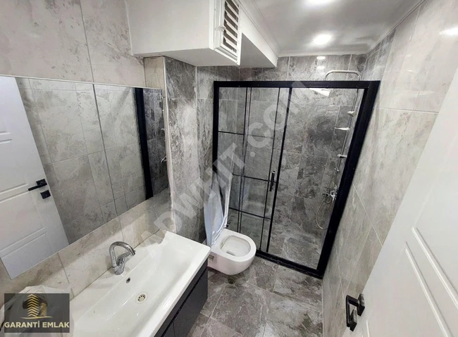 شقة جديدة للبيع مع موقف سيارات، 2+1، 70 متر مربع، طابق أرضي، في YEŞİLOVA