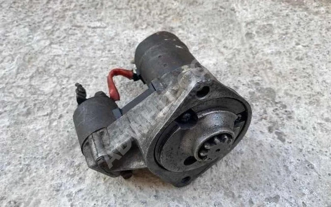 OPEL COMBO B starter motor (original) used