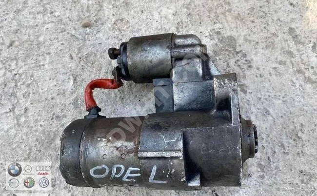 OPEL COMBO B starter motor (original) used