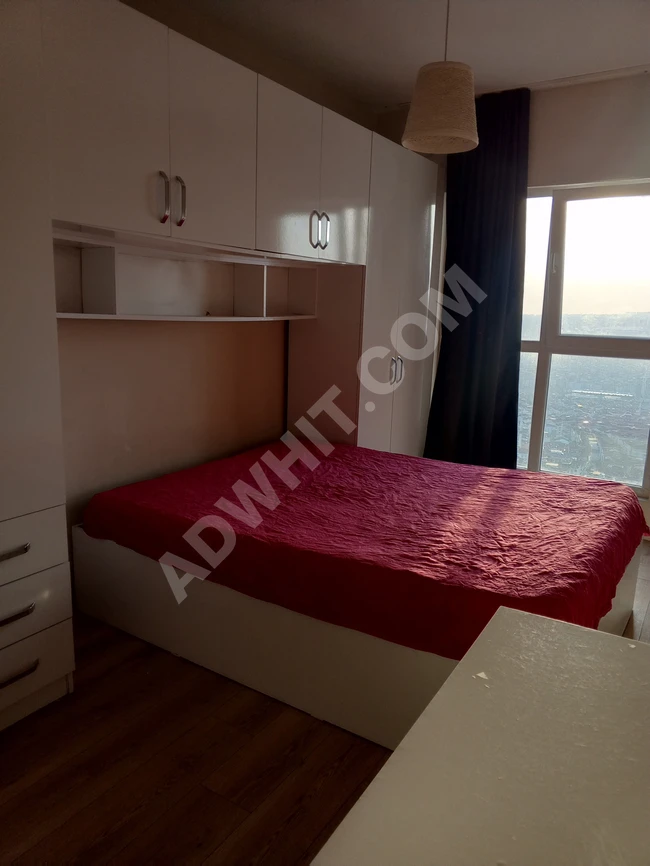 For sale: an apartment with views of the sea, the city, and the pool.