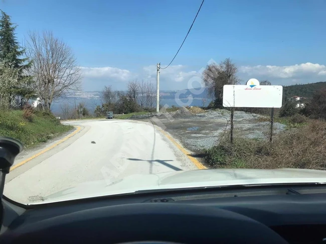 KARAMÜRSEL PAZARKÖYDE DENİZ MANZARALI SATILIK ARSA