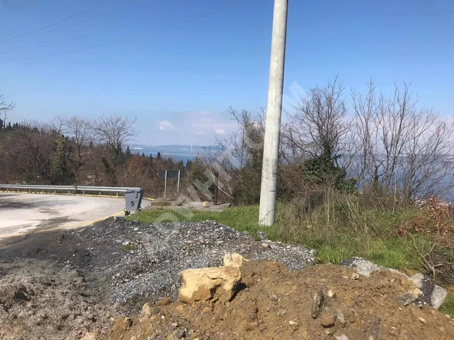 KARAMÜRSEL PAZARKÖYDE DENİZ MANZARALI SATILIK ARSA