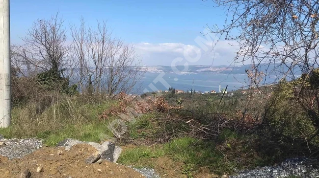 KARAMÜRSEL PAZARKÖYDE DENİZ MANZARALI SATILIK ARSA