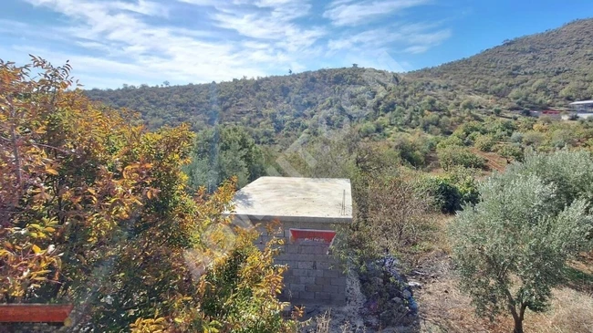 MARAŞ EMLAKTAN ANA YOL KENARI UZUNSÖĞÜT DE SATILIK 5 DÖNÜM BAĞ