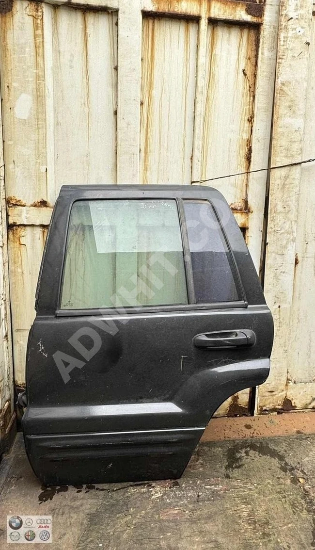 JEEP CHEROKEE WJ SOL ARKA KAPI DOLU (ORJİNAL) ÇIKMA