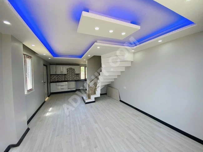 YENİÇİFTLİKTE MERKEZİ KONUM GENİŞ BAHÇELİ İMAR YOLA CEPHE VİLLA