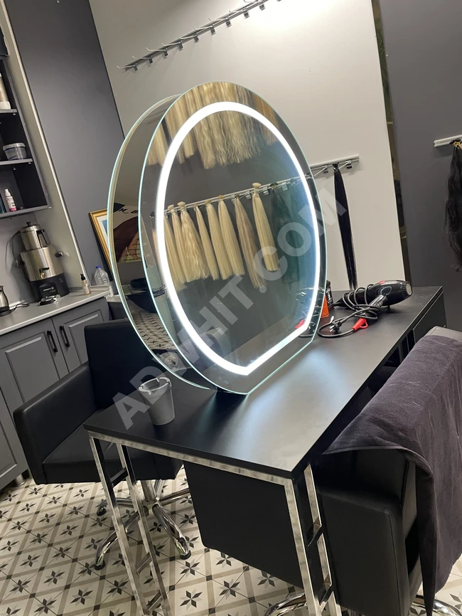 Laundry set and a table with a mirror