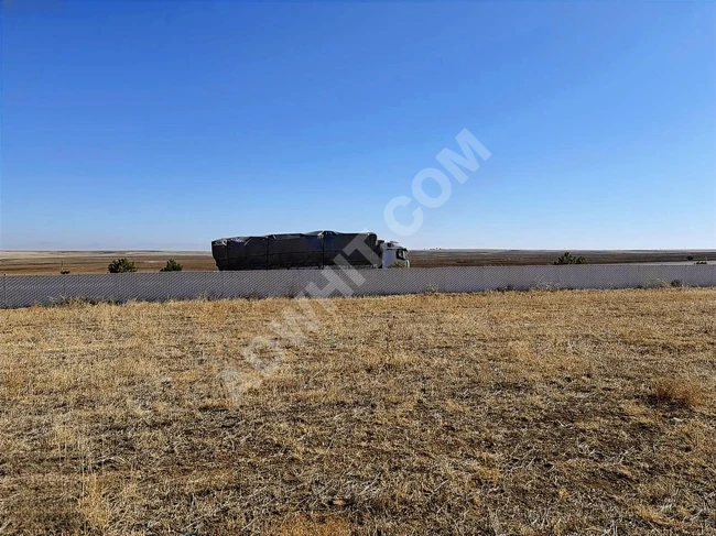 AFYON EMİRDAĞ'DA ESKİŞEHİR KONYA YOLUNA CEPHE 49.233M2UYGUN ARSA