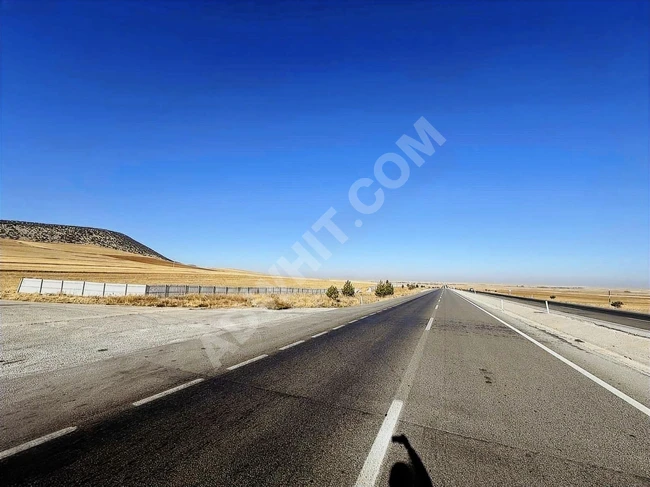 AFYON EMİRDAĞ'DA ESKİŞEHİR KONYA YOLUNA CEPHE 49.233M2UYGUN ARSA