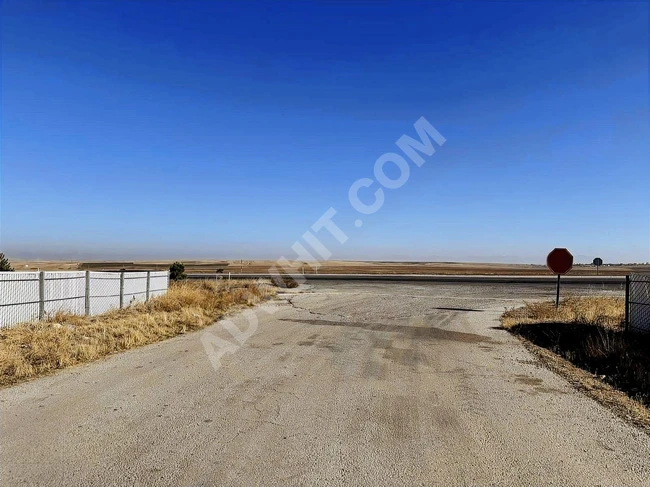 AFYON EMİRDAĞ'DA ESKİŞEHİR KONYA YOLUNA CEPHE 49.233M2UYGUN ARSA