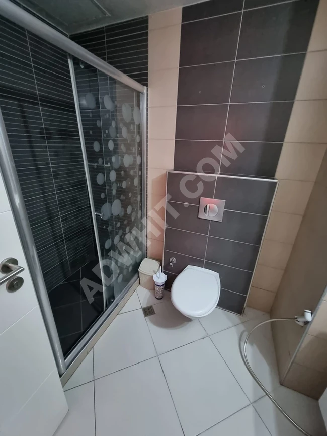 شقة بإطلالة مميزة على المسبح ضمن مجمع أنوفيا 3 في اسطنبول