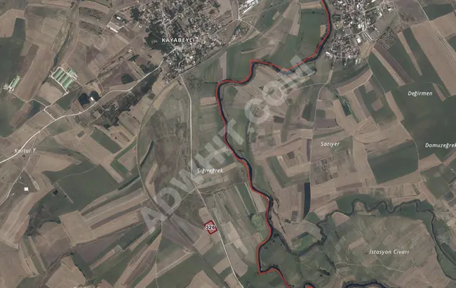 Kayabeyli Köyü’nde Satılık 6.950 m² Asfalt Cepheli Tarla