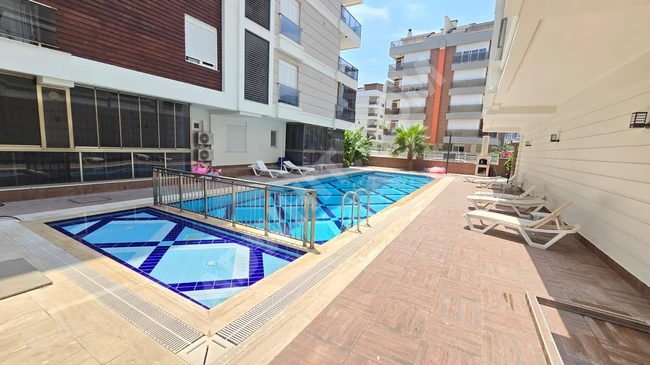 أنطاليا - كونيالتي شقة لوكس 2+1 للبيع ضمن مجمع متكامل 