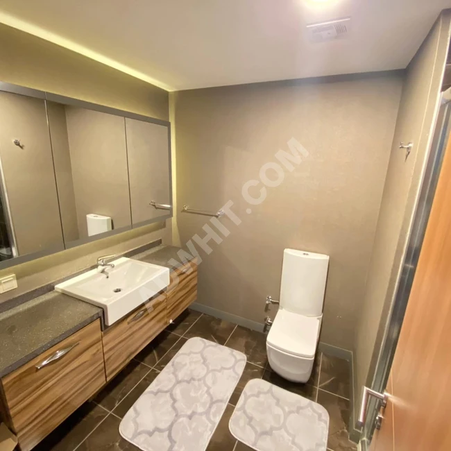 شقة ثلاث غرف وصالون للبيع مجمع اغى أوغلو 