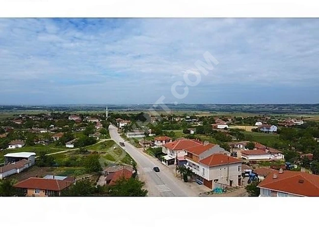 Plot of 198 m² Facing the Road Close to the Village - High Potential!