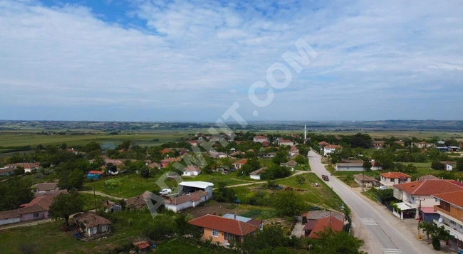 Plot of 198 m² Facing the Road Close to the Village - High Potential!