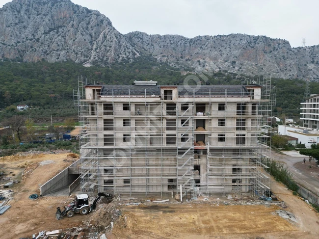 أنطاليا - كونيالتي شقق جديدة 2+1 للبيع اطلاله مميزة على الجبل 