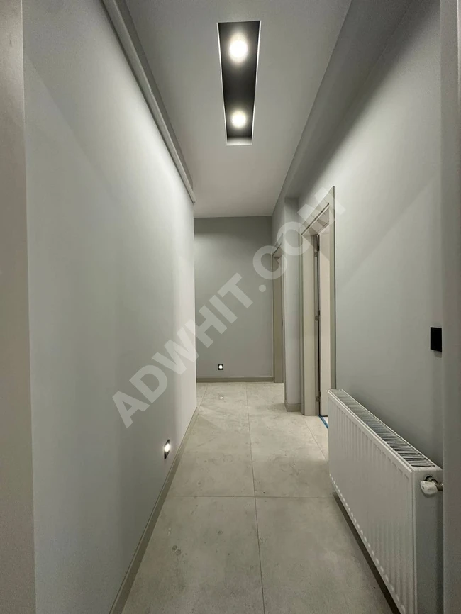 شقة جديدة 2+1 في إدرميت  EDREMİT مزودة بالغاز الطبيعي، بمصعد وحمام خاص لغرفة النوم الرئيسية.