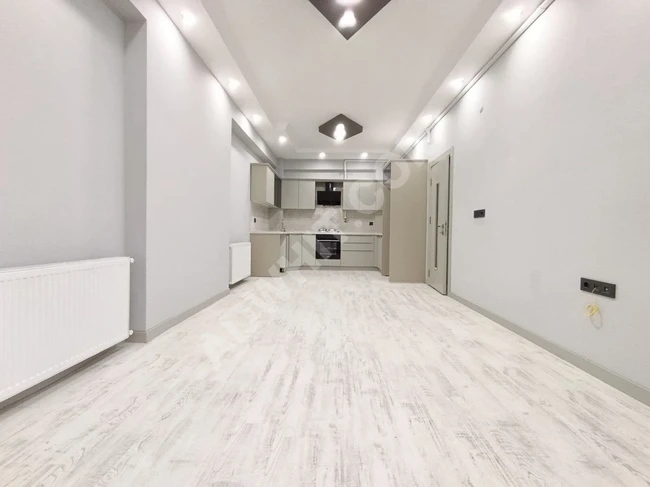 شقة جديدة 2+1 في إدرميت  EDREMİT مزودة بالغاز الطبيعي، بمصعد وحمام خاص لغرفة النوم الرئيسية.