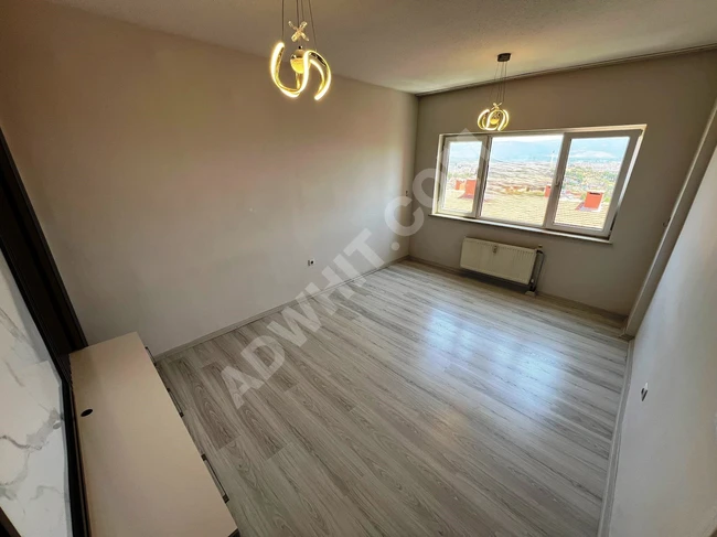 EDREMİT TOKİ EVLERİNDE DOĞALGAZLI ASANSÖRLÜ AYRI MUTFAKLI 2+1