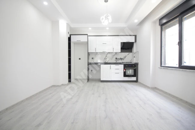 ALTINKUMDA DOGALGAZLI ASANSÖRLÜ GENİŞ BALKONLU SIFIR 1+1 DAİRE