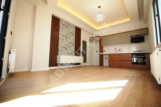 Brand new luxury 2+1 apartment in Altinkum with natural gas, elevator, and glass balcony