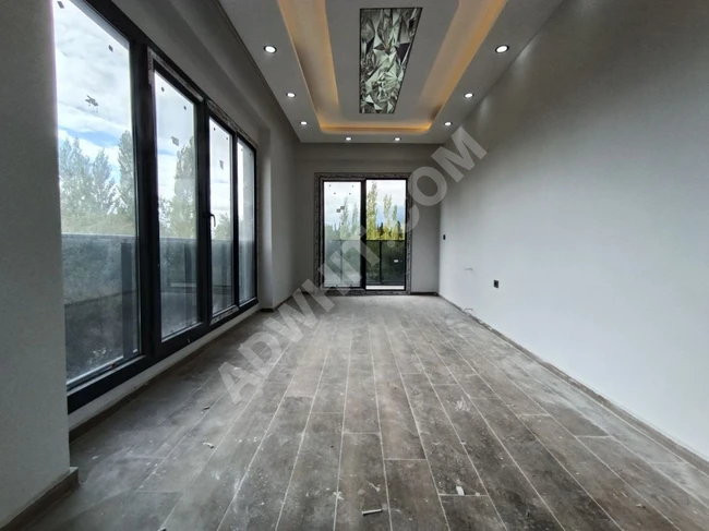 ZERO 2+1 WITH ELEVATOR AND SEPARATE KITCHEN, INTEGRATED WITH NATURE IN ZEYTINLI VILLAGE