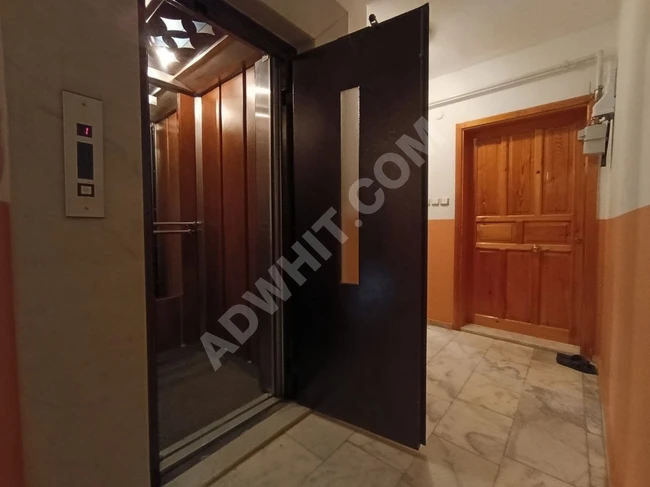 2+1 Apartment in Altınkum with Natural Gas, Elevator, Parking, and Separate Kitchen