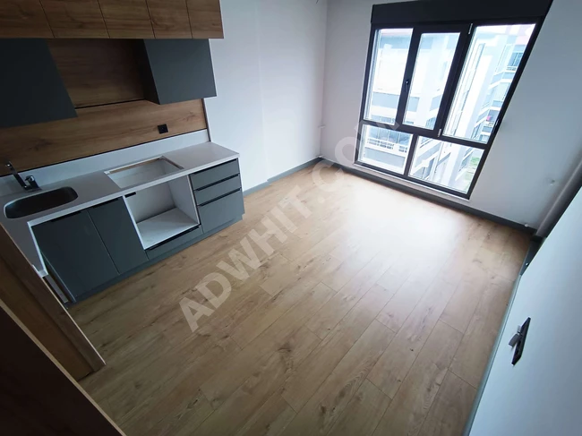 ALTINKUMDA ASANSÖRLÜ GENİŞ BALKONLU SATILIK 1+1 SIFIR LÜX DAİRE