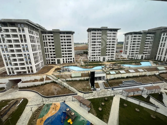 إملاك كونوت Emlak Konut   - شقة جديدة 3+1 للبيع في مشروع بزم محلة Bizim Mahalle