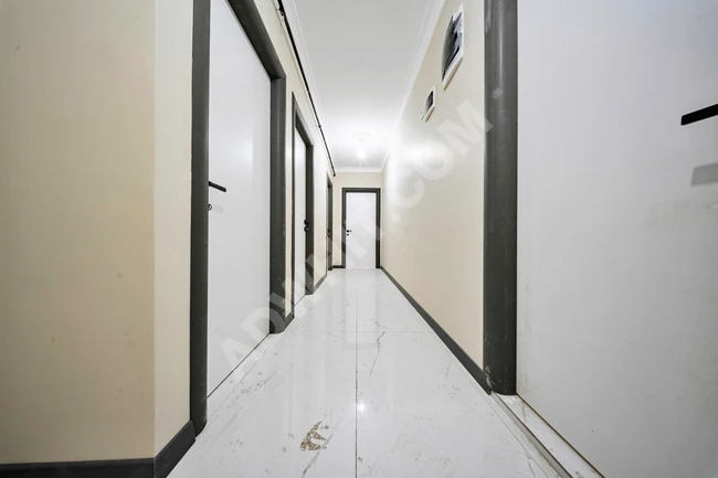 شقة فاخرة جديدة للبيع في كوتشوك شكمجه Küçükçekmece İstasyon Mh مع موقف سيارات مغلق