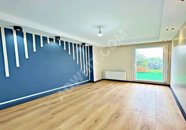 Luxury apartment with a garden view within a complex for sale in Istanbul at an attractive price.