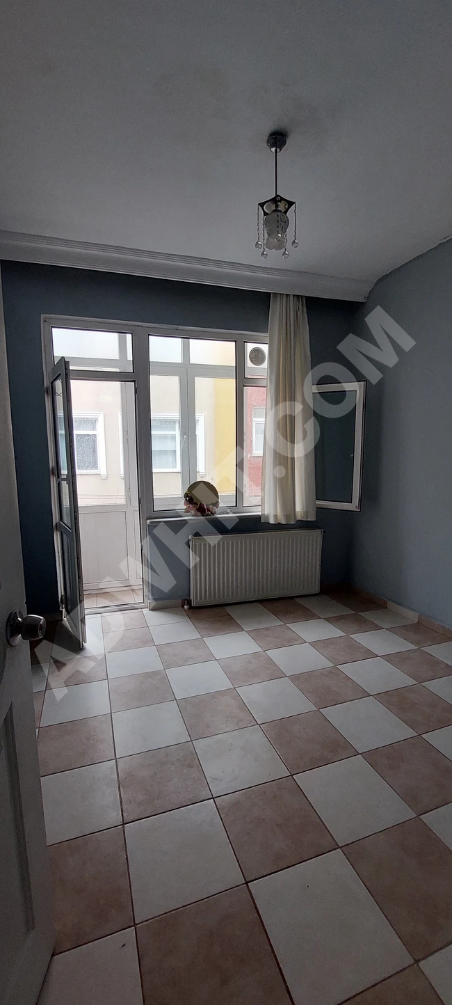 2+1 apartment for rent with a living room at the corner from Emlak Center
