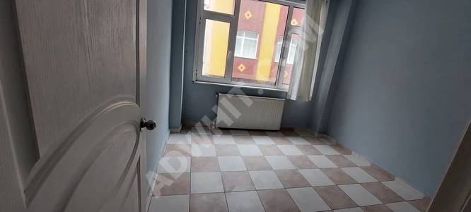 2+1 apartment for rent with a living room at the corner from Emlak Center