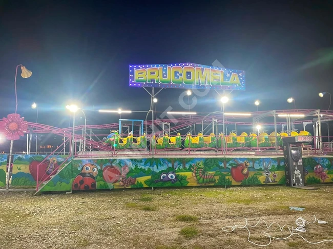 Brucomela Ride. لعبة قطار دودة التفاح مستعملة للبيع
