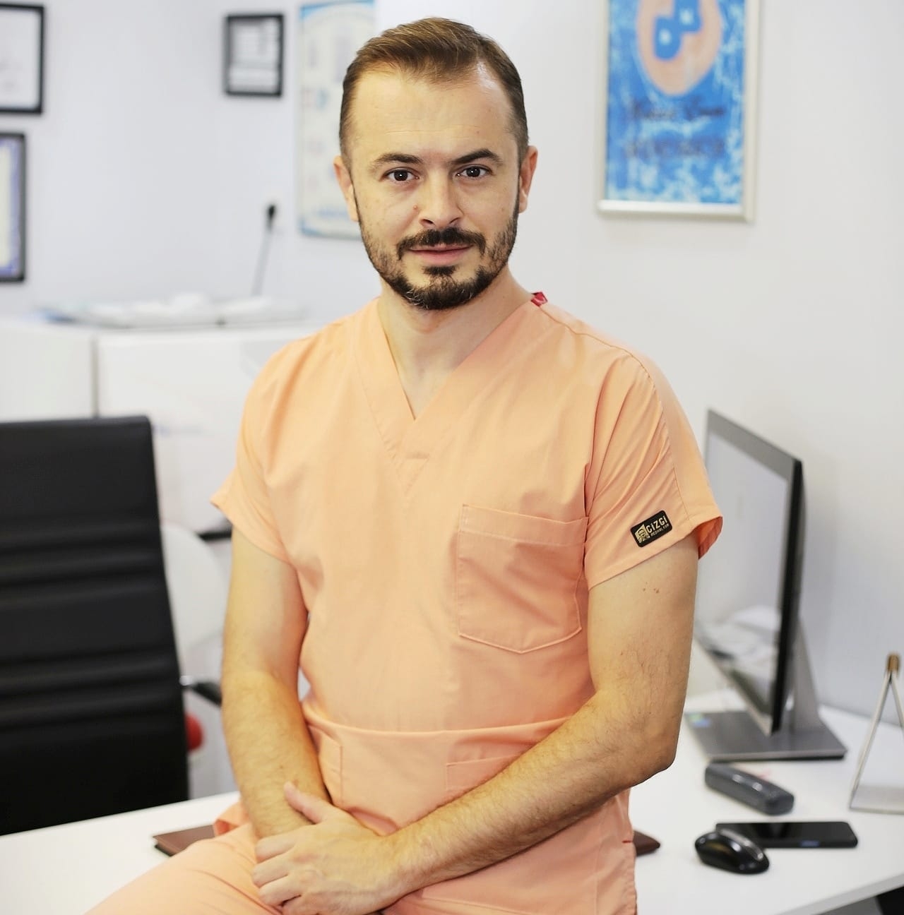 Dt. Mehmet Emre Bozaba